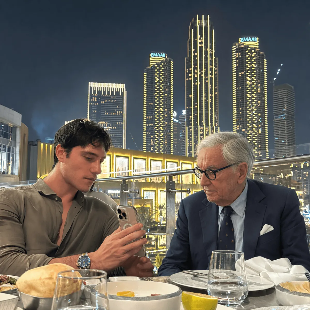 A Growth Cab founder in a dinner meeting with an executive
