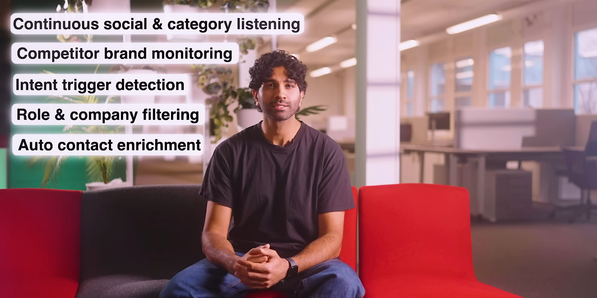 FlashLabs presenter on a red sofa in an open office next to labels reading continuous social and category listening, competitor brand monitoring, intent trigger detection, role and company filtering and auto contact enrichment